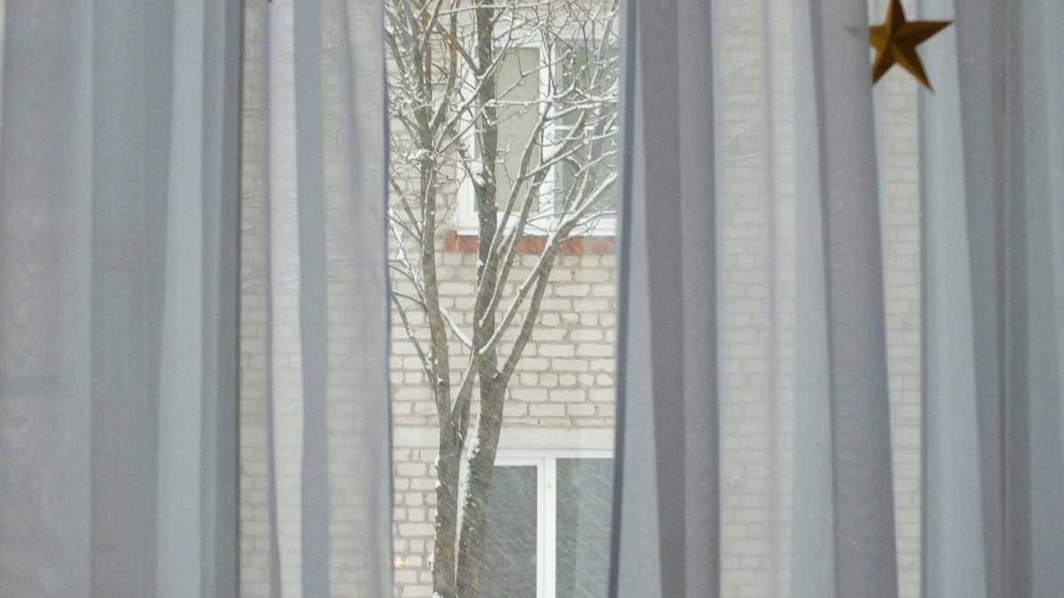 white and gray floral window curtain